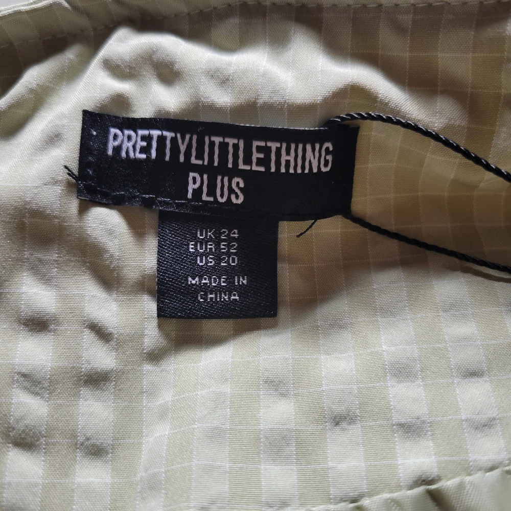 PrettyLittleThing Plus Olive Green Quilted Vest